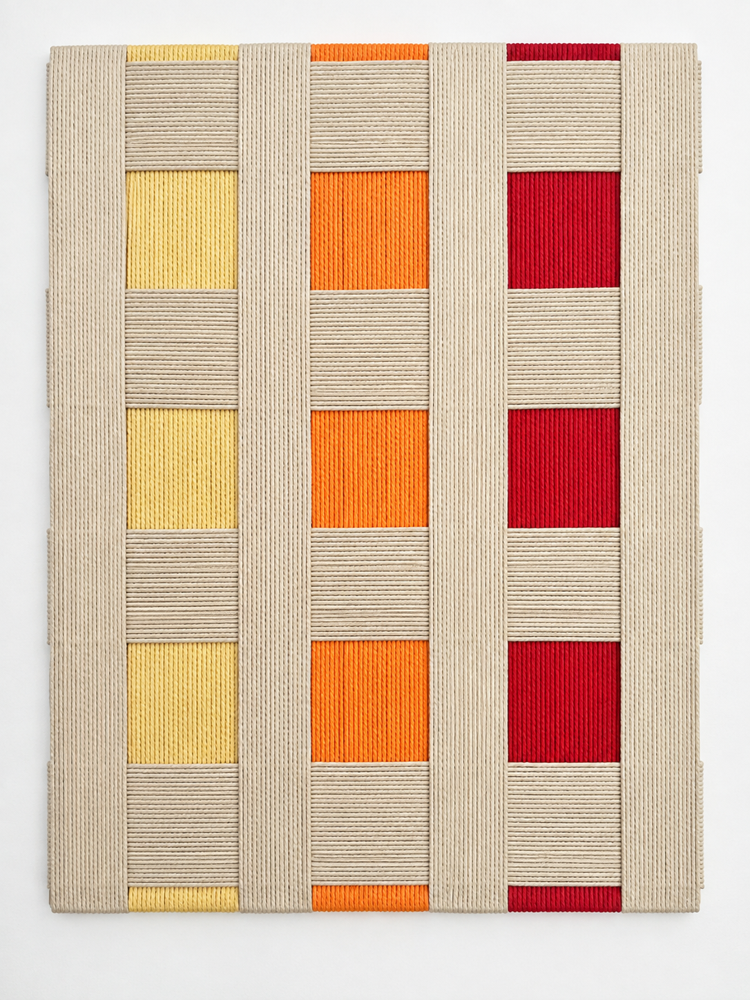 Yellow orange red and beige macramé wall art
