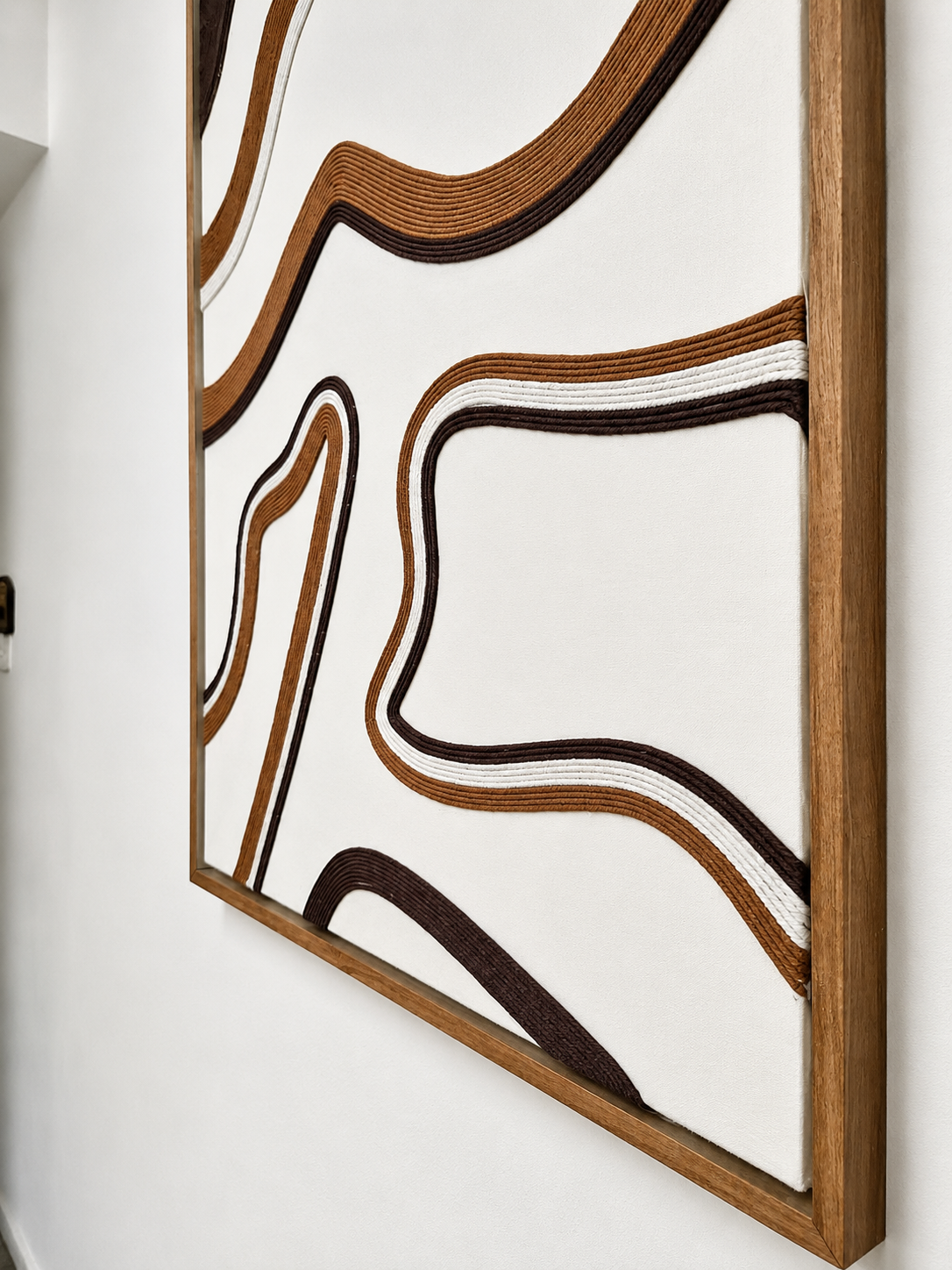 Brown framed macrame artwork UAE