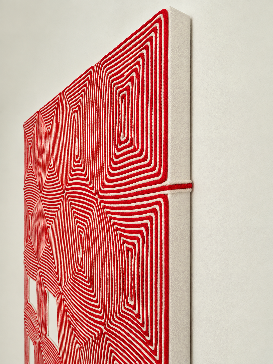 Red and cream macramé wall art Dubai
