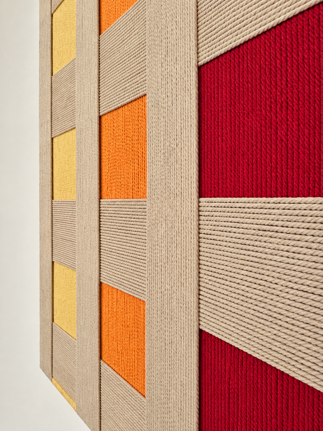 Yellow orange red and beige macramé wall art